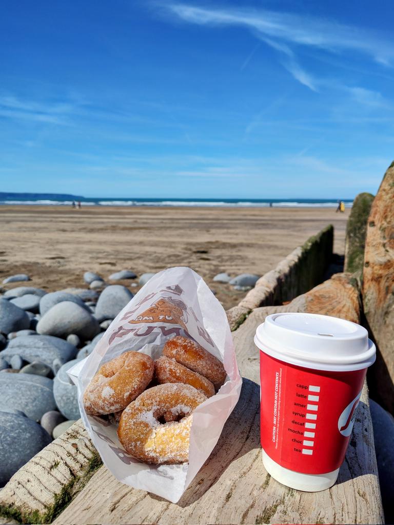 Coffee and donuts at the beach. A perfect day. #westwardho!