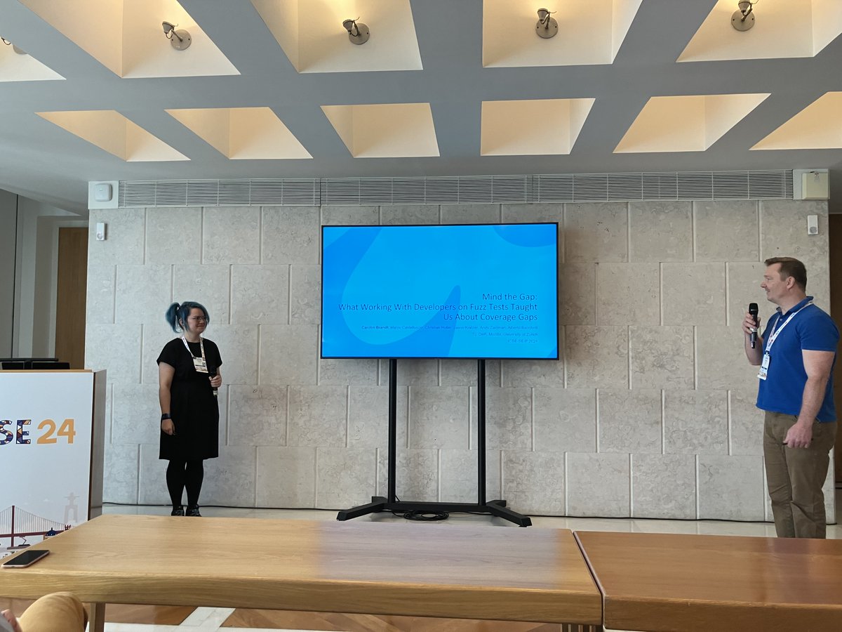 Andy Zaidman (@azaidman) on Twitter photo .<a href="/laci_noire/">Carolin Brandt 🐳</a> presenting “Mind the Gap: What Working With Developers on Fuzz Tests Taught Us About Coverage Gaps”
Work done with <a href="/mozilla/">Mozilla</a> and <a href="/sback_/">Alberto Bacchelli</a>
Presentation <a href="/ICSEconf/">ICSE</a> #ICSE2024
(and thanks for the nice intro <a href="/mboehme_/">Marcel Böhme👨🔬</a>, who knew Caro from Twitter and praised her graphics) .<a href="/laci_noire/">Carolin Brandt 🐳</a> presenting “Mind the Gap: What Working With Developers on Fuzz Tests Taught Us About Coverage Gaps”
Work done with <a href="/mozilla/">Mozilla</a> and <a href="/sback_/">Alberto Bacchelli</a>
Presentation <a href="/ICSEconf/">ICSE</a> #ICSE2024
(and thanks for the nice intro <a href="/mboehme_/">Marcel Böhme👨🔬</a>, who knew Caro from Twitter and praised her graphics)