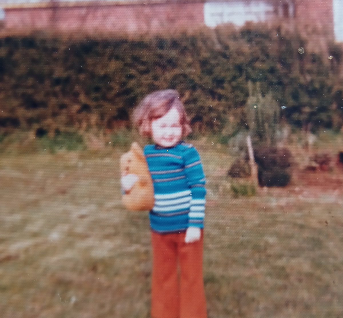 #T.B.T I used to love that odd looking bear thing. It had no nose and was called 'Sniffy' Particularly think the russet flares with hooped polyester jumper was quite the daring paring . Have a charming day xx
