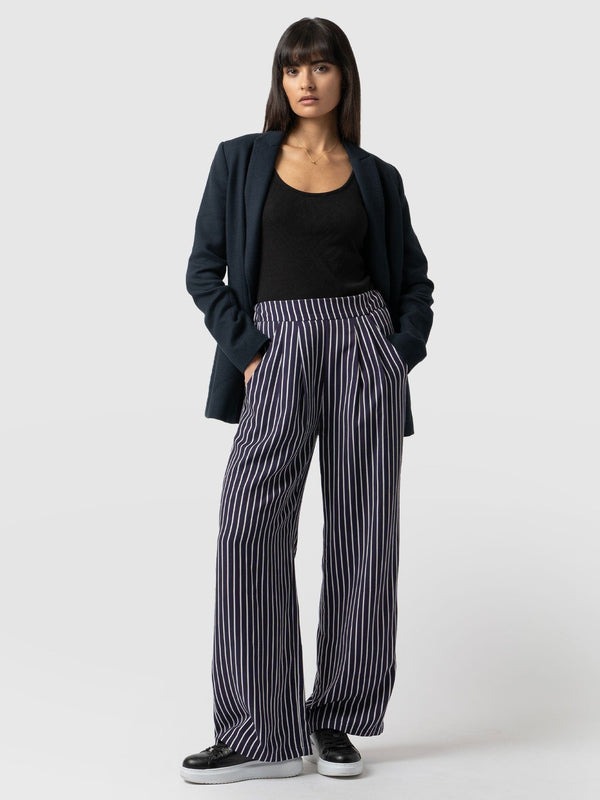 Cut a dash this SS24 in an arresting pair of striped trousers inc these navy striped trousers from Saint + Sofia #stripes bit.ly/3U6zCps