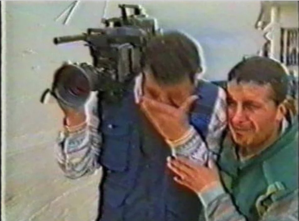 This image speaks for itself. Reporters reporting on the Qana massacre.