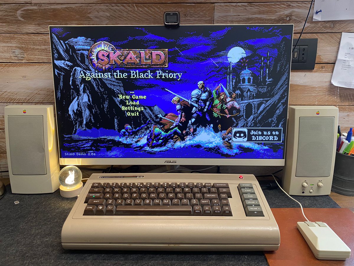 McValdemar's tweet photo. After the insanely good live-action trailer of #Skald I wanted to play the game with the most fitting setup.
Win11 based PC in a #Commodore64, beige monitor from #Asus, vintage beige speakers by #Apple,  #Amiga tank-mouse to complete the set.
Now I feel ready for the adventure! https://t.co/dvfcNXg9kw