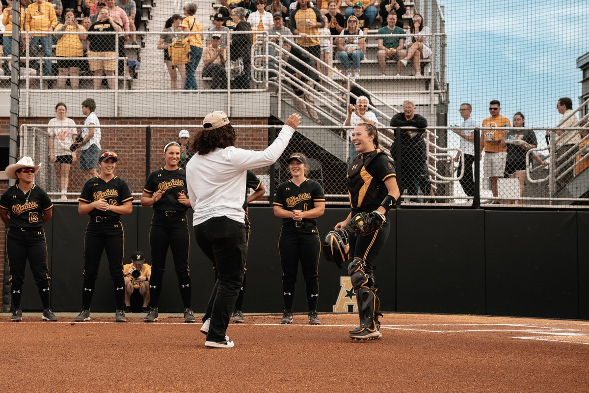 looks like a strike from this angle 😏 yesterday, @78jocelyn_alo threw out the first pitch at Wilkins Stadium! #AUX x @GoShockersSB