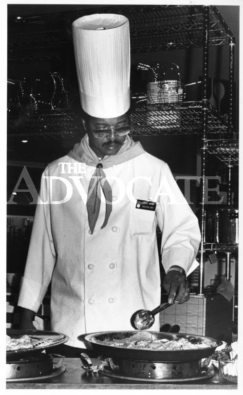 #TBT This is a photo from March 17, 1983, of Steve Brown, chef at Jacques Restaurant in the Sheraton Hotel, demonstrating cooking techniques at the D.H. Holmes, Bon Marche. You can find this photograph and more in the Baton Rouge Room's digital archive on our website.