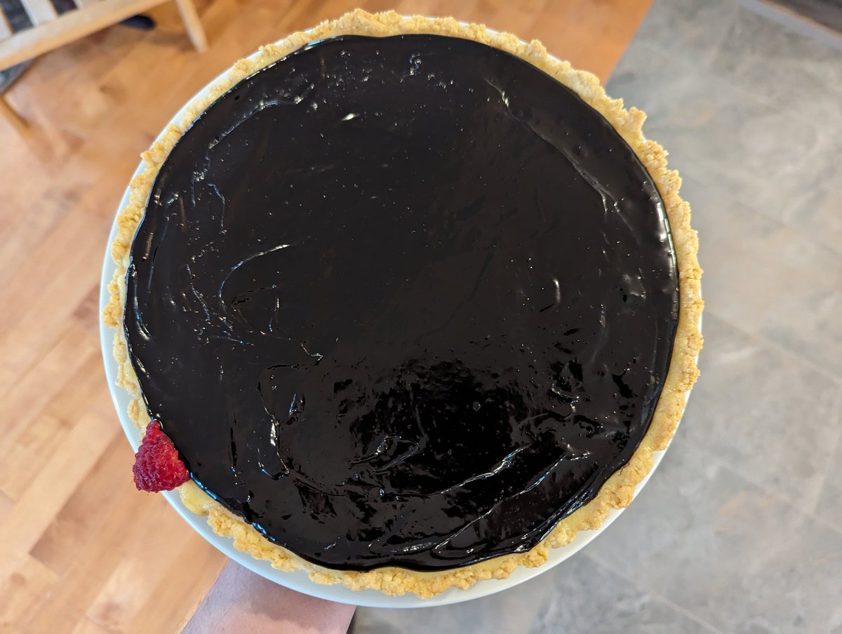 Cat Viglienzoni (@wcax_cat) on Twitter photo "Total Eclipse of the Tart". It's a cream cheese filling sun blocked by a dark chocolate ganache moon with a shortbread crust corona and a single raspberry prominence. It's for the Dessert Day contest at <a href="/wcax/">Channel 3 News</a> today! "Total Eclipse of the Tart". It's a cream cheese filling sun blocked by a dark chocolate ganache moon with a shortbread crust corona and a single raspberry prominence. It's for the Dessert Day contest at <a href="/wcax/">Channel 3 News</a> today!