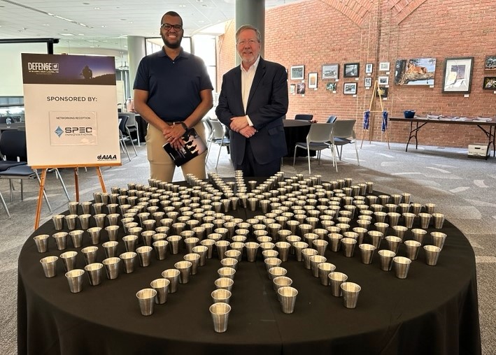 Setting our sights on the stars at the 2024 #AIAADefenseForum! Our sponsor table shines bright with our swag cups, a tribute to #AIAA's stellar dedication to space exploration and engineering excellence. 🌟 @aiaa