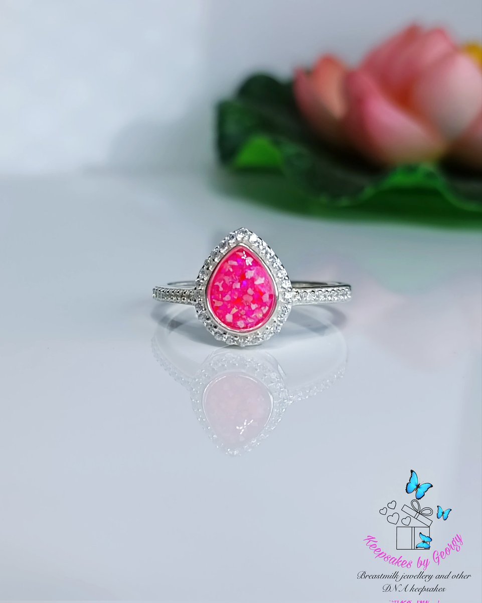 Cremation ashes and pink opal ring in loving memory of a beloved father. 
The feedback from my client about this angelic keepsake ring is: 'a hug from my dad, I'm so happy with it, I can't thank you enough Georgy, pictures don't do it justice'
#memorialjewellery #angelicring #dna