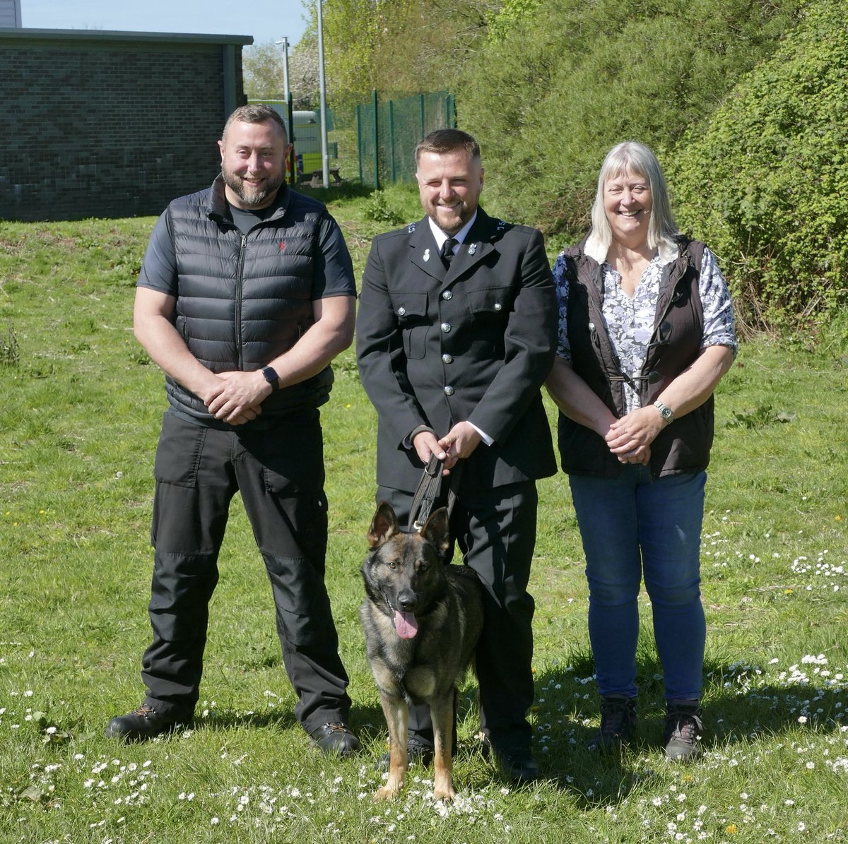 PD Rico being reunited with his puppy walkers Ian and Lyn Parlour at today’s passing out parade.