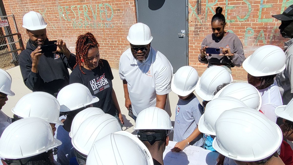 St. Philip's 5th graders visited the future home of @RuthiesForGood on MLK. They learned about the construction business and how to read blueprints with the Young Black Builders Club (YBBC) of Simply Custom! 🚧👷‍♂️🏗️🔨 #ThrivingTogether #StPhilips1600