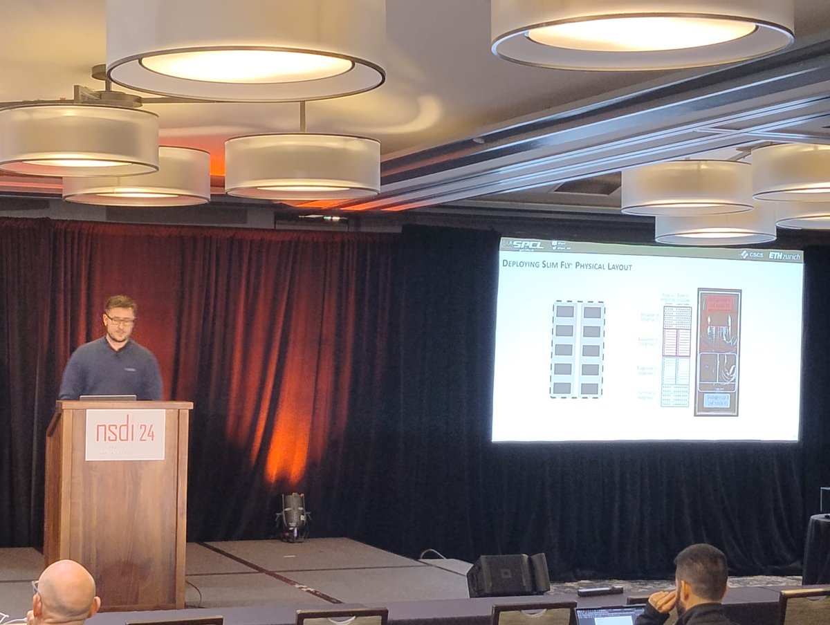 SPCL@ETH (@spcl_eth) on Twitter photo Happening right now at #NSDI👉 <a href="/nilsblach/">Nils Blach</a> presenting "A High-Performance Design, Implementation, Deployment, and Evaluation of The Slim Fly Network" and Daniele De Sensi presenting his paper "Swing: Short-cutting Rings for Higher Bandwidth Allreduce"
<a href="/thoefler/">Torsten Hoefler 🇨🇭</a> <a href="/CSatETH/">ETH CS Department</a> #HPC Happening right now at #NSDI👉 <a href="/nilsblach/">Nils Blach</a> presenting "A High-Performance Design, Implementation, Deployment, and Evaluation of The Slim Fly Network" and Daniele De Sensi presenting his paper "Swing: Short-cutting Rings for Higher Bandwidth Allreduce"
<a href="/thoefler/">Torsten Hoefler 🇨🇭</a> <a href="/CSatETH/">ETH CS Department</a> #HPC