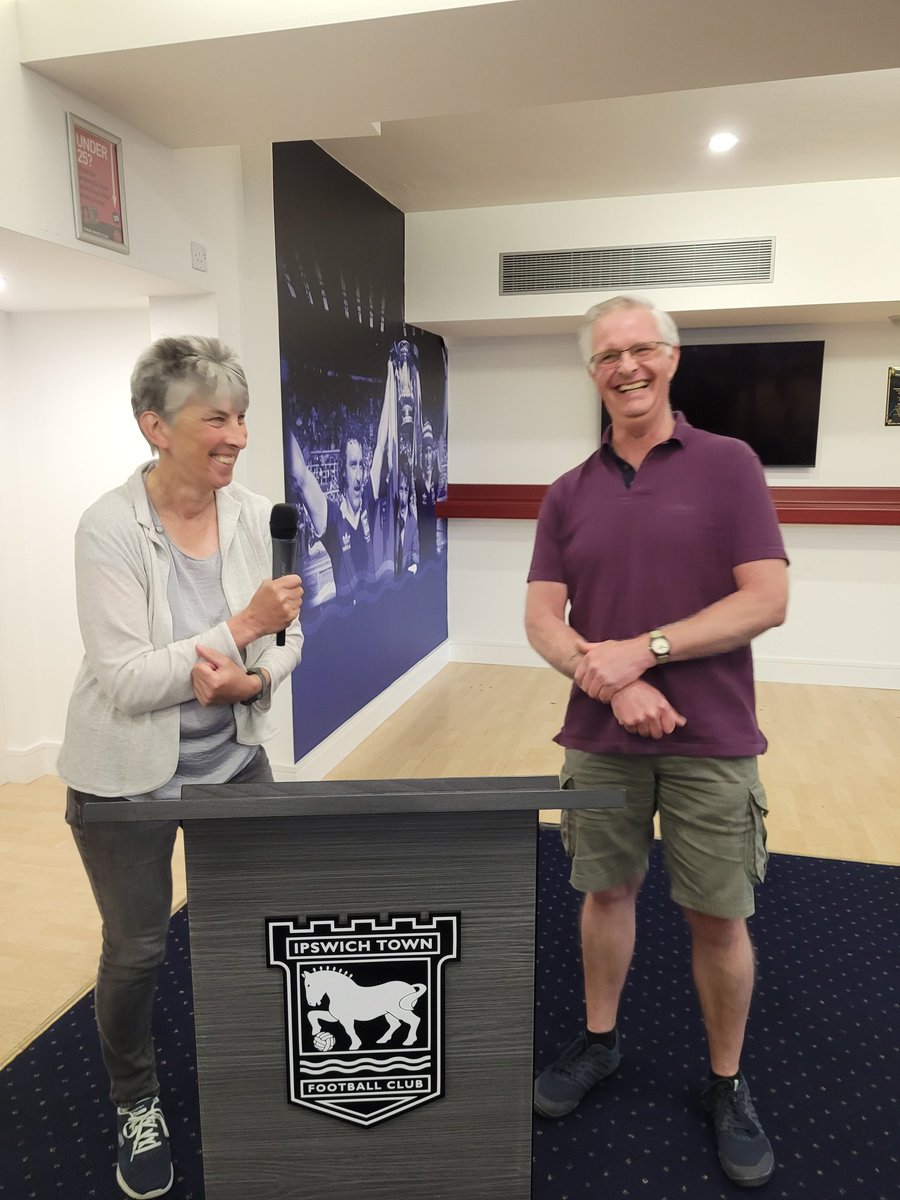 @at_ipswich thanks for the opportunity to speak at your conference today.  @PeterBe1130 & I love these opportunities to share our story #dementia #livingwell #positivity. Hard for a Gooner to pose by the @IpswichTown logo without flashbacks to 1978🙃 @RadioJohnnie @AlzAuthors