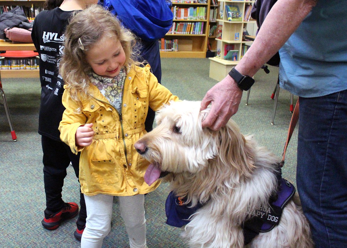 Night at the Village was a night of pizza, pups, pics, games &amp; BOOKS! The One School, One Book launch was a chance for families to pick up this year's selection, "Escape from Mr. Lemoncello's Library" by <a href="/CGrabenstein/">Chris Grabenstein</a>. Families will read the book together over the next few weeks.