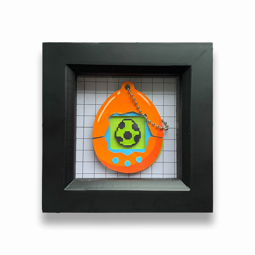 remouse1991's tweet photo. My Tamagotchi paper cuts are now available through my online store! Each one is meticulously handcrafted, making them individually unique. These nostalgic pieces of art offer all the charm of owning a Tamagotchi without the worry of it ‘dying’! Simply click the link in my profile https://t.co/V7KkJkFwJ1