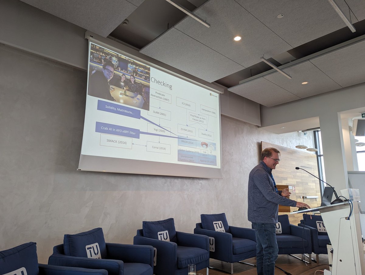 Thank you @byroncook and @BjornerNikolaj for your keynotes at the @CSecCenter kick-off @tu_wien! On the top left of the slide, covering symbolic model checking, a picture of our rooftop dinner in Vienna, together with Laura Kovacs!