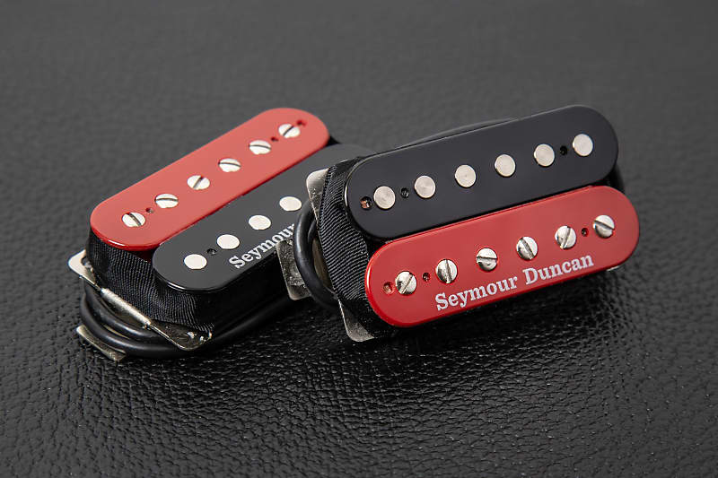 The color combo so nice we did it twice! Our Hot Rodded Humbucker Set (JB in the bridge and Jazz Model in the neck) is now available in red and black. Get a set while they last via a custom run at @Reverb: hubs.la/Q02tlnjV0

#SeymourDuncan #HotRoddedHumbucker