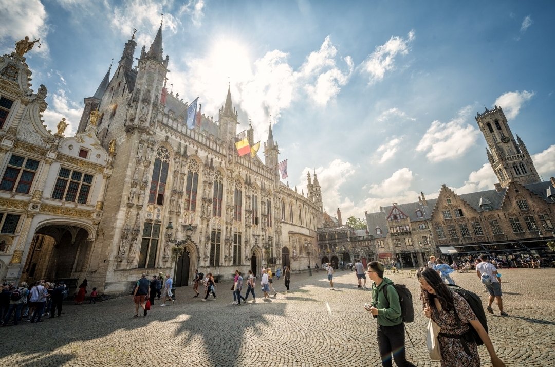 The beauty and history of Bruges captured in 1 photo
- the 14th c. town hall
- the 15th / 19th c Holy Blood Chapel built on top of 12th c. St Basil's Chapel
- the 16th/17th c. Palace of the Liberty of Bruges 
- the 13th / 15th c. Belfry Tower