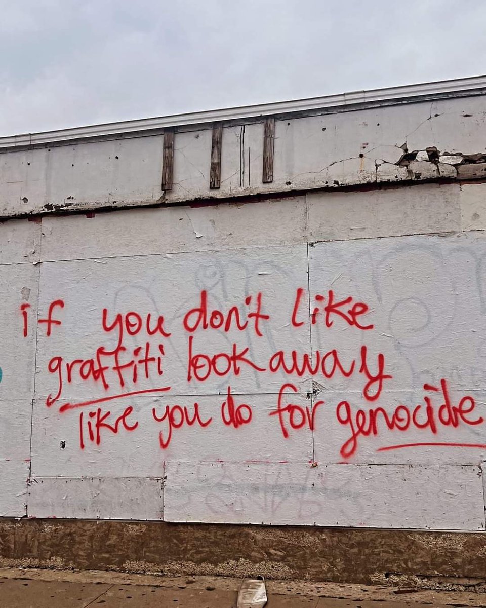 'If you don't like graffiti look away like you do for genocide' Seen in Austin, Texas