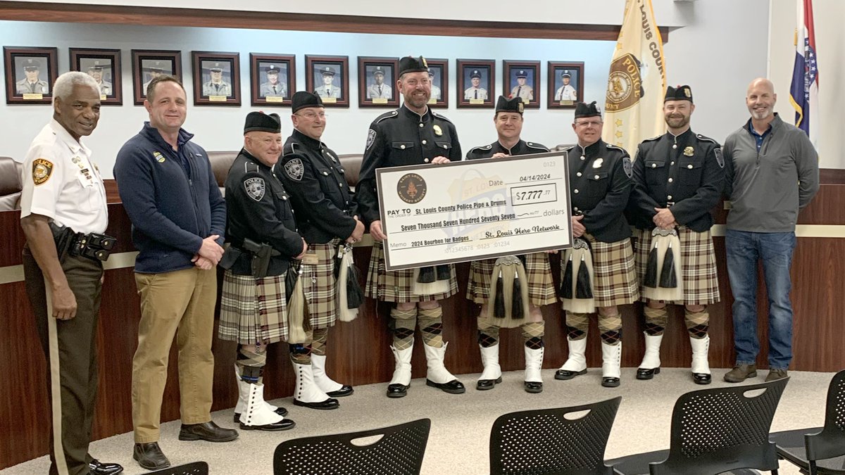 The founder of STL Hero Network, Charlie Metzner, presented a donation today of $7,777.77 to the St. Louis County Police Pipes & Drums from their Bourbon for Badges fundraiser. We thank them for their support!