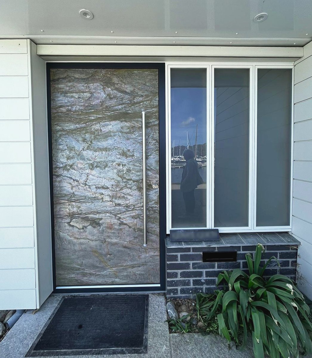 🚪✨ Check out our latest installation by our Wadebridge team: a sleek slate stone finished door. Durable, stylish, and crafted to perfection by our joinery workshop. #HomeImprovement #SlateStoneDoor #Wadebridge #RenovationReady camelglass.co.uk/doors/inspirat…