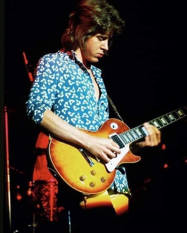 A great shot of Mick Taylor, master of slide, …play the guitar, boy! #RollingStones