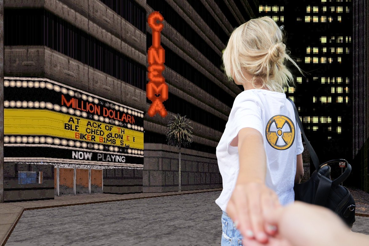 A Blonde Girl takes the hand of someone and pulls them toward Duke Nukem 3D's E1M1, Hollywood Holocaust's Theatre.