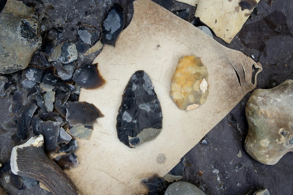 Palaeolithic handaxes were used across a vast period of time. Minutes to make and often discarded after only a brief period of use. Small numbers of handaxes in one area became many over thousands of years of people returning to the pull factors of water, food and flint.