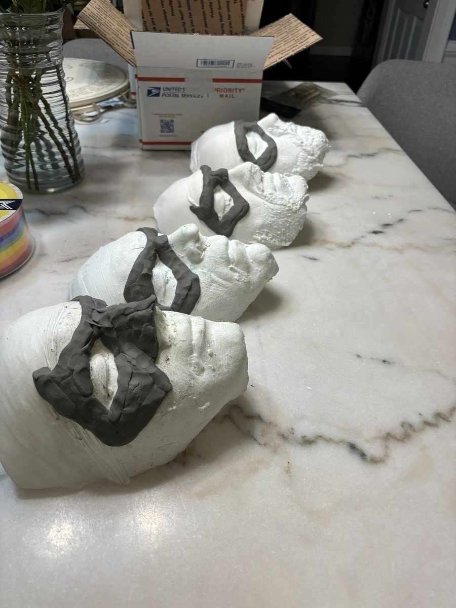 MobsterArtist85's tweet photo. Heads all over the dining room table 😂Working on some face mask sculpts for a client. https://t.co/w7yYVbexLj