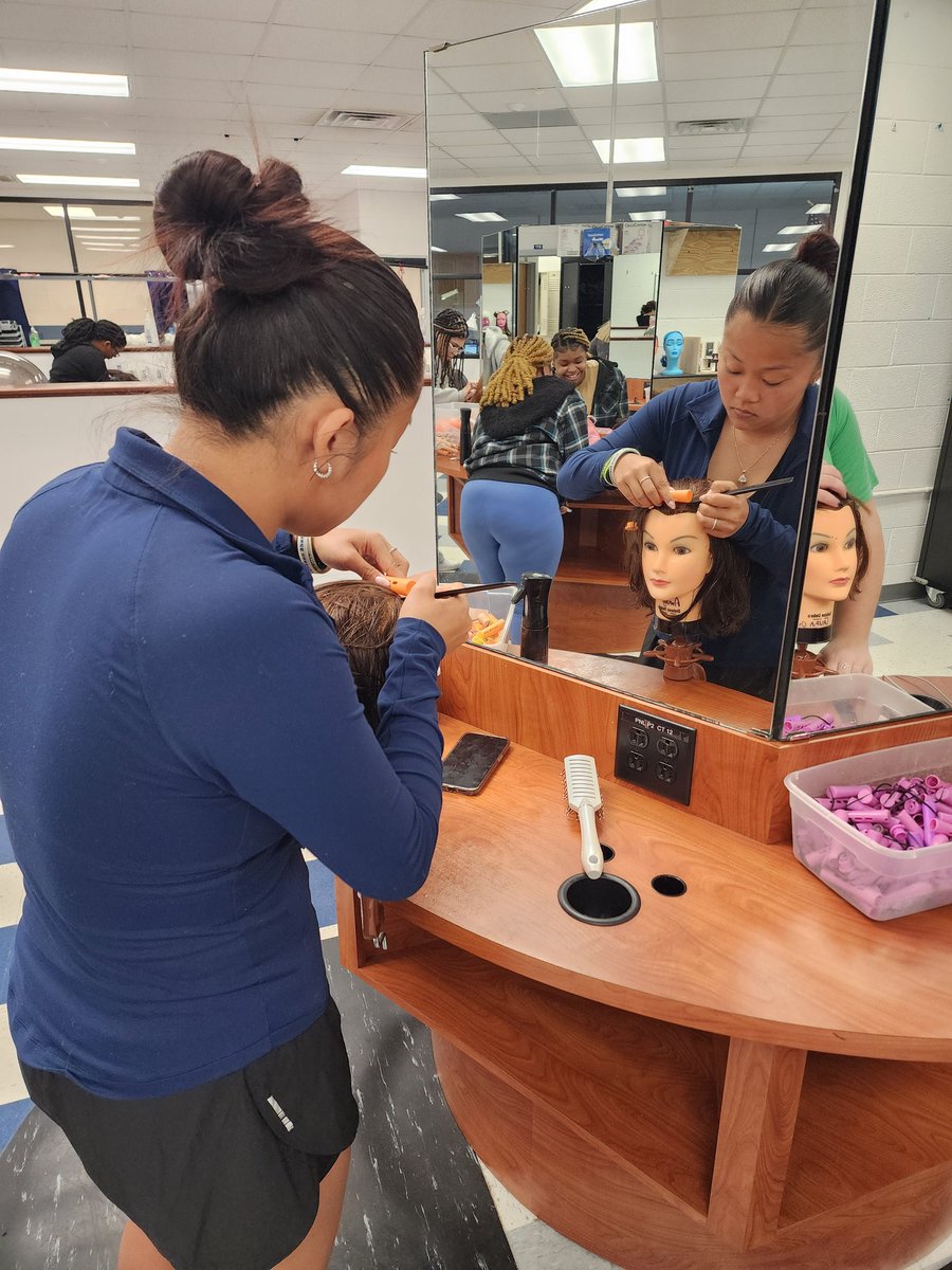 The mannequin doesn't know it yet, but she's about to receive a beautiful style of braids, courtesy of #Cosmetology student Amaya Cao-Wang of @ClippersGrafton. #WeAreNewHorizons #leadingboldly @NHREC_CTE_WL @NHREC_VA