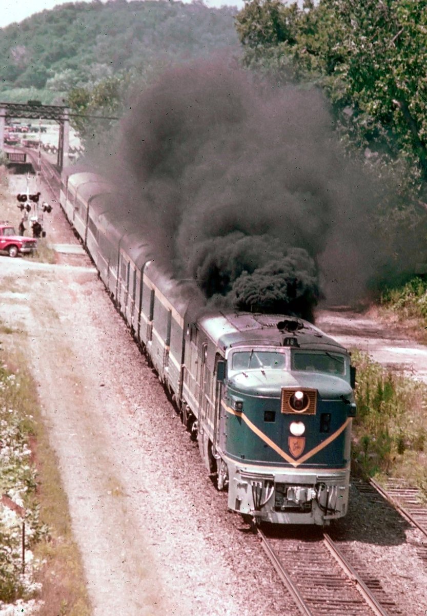 Delaware & Hudson PA #18 throttles up as it departs Waterford, New York with the northbound Laurentian in the late 1960's. Jim Shaughnessy photo. american-rails.com/90778.html