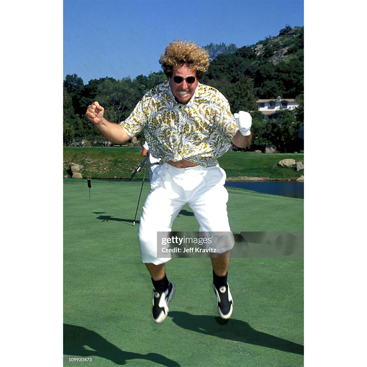 Kari and I back in 1994 at Eddie's charity golf tournament. What an eclectic bunch of folks showed up for this one. I don't even play golf but what a cool event #Golf #BigFun #WackyHairdo #WhatWasIThinking