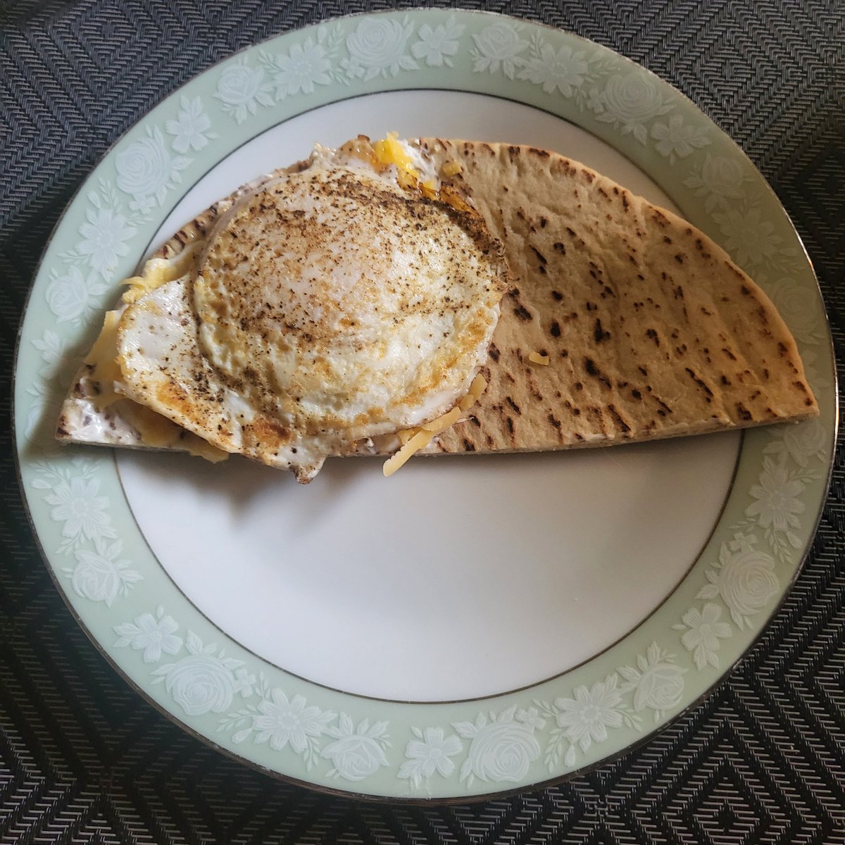 creamcheese, chedder, & egg on half a pita slice for lunch ^_^