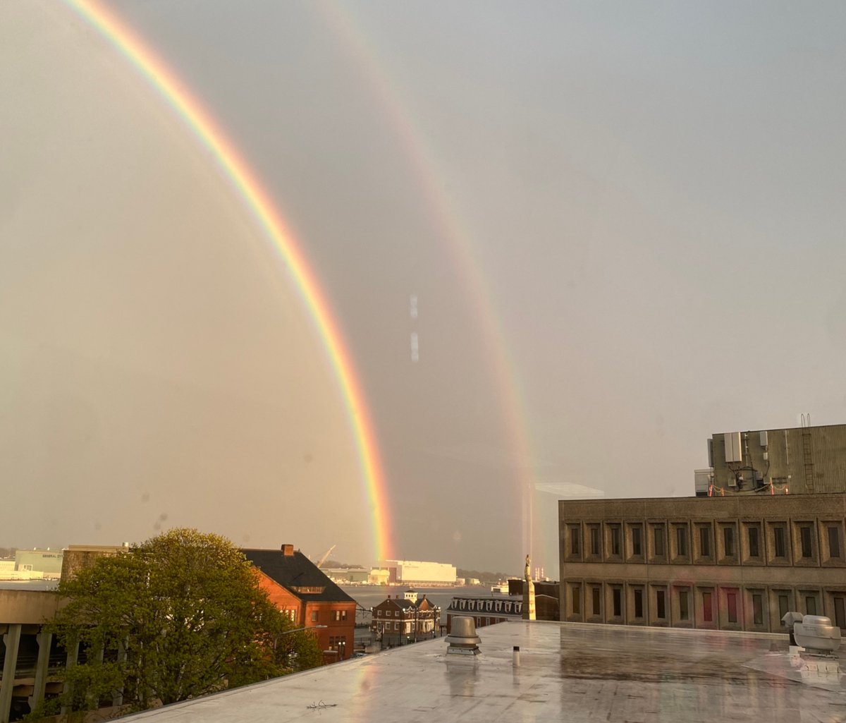 thedayct's tweet photo. The pot of gold at the end of this double rainbow is square in the middle of @GDElectricBoat. Reporter @d_drainville took this from The Day's newsroom. https://t.co/h8fZufGZes