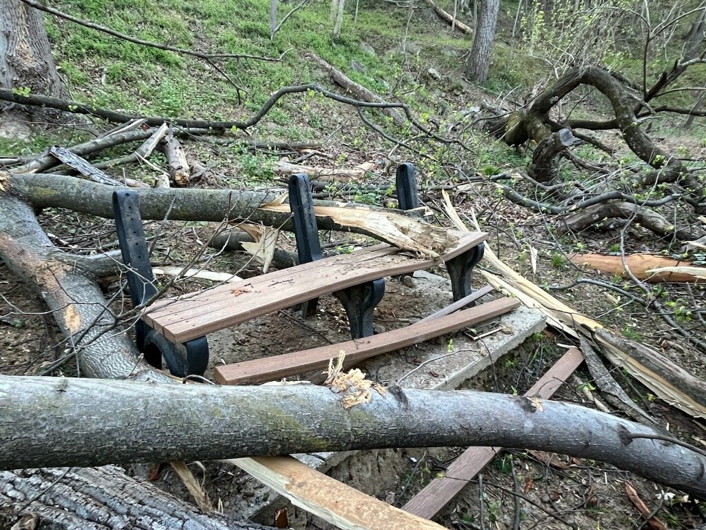 the bench on the #NorthWestBranch trail got destroyed during one of the recent storms @mcparksrec. the plaque was still on the ground on Tuesday. can you check it out? @dmwine