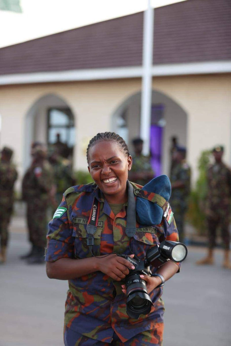 In the shadows of sorrow, we mourn today, Sergeant Rose Nyawira Gen Ogola photographer, with talents to portray. With lens in hand, she captured moments true, Now in the heavens, her spirit anew. In the crash's aftermath, our hearts heavy with pain, Her artistry silenced,