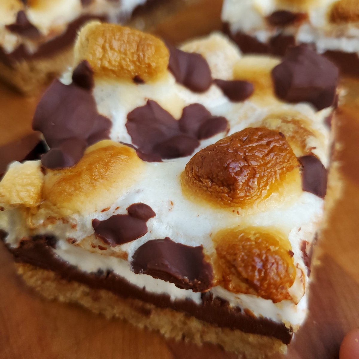 Who wants a warm and gooey dark chocolate s'mores bar? #food #cooking #baking #foodpoll