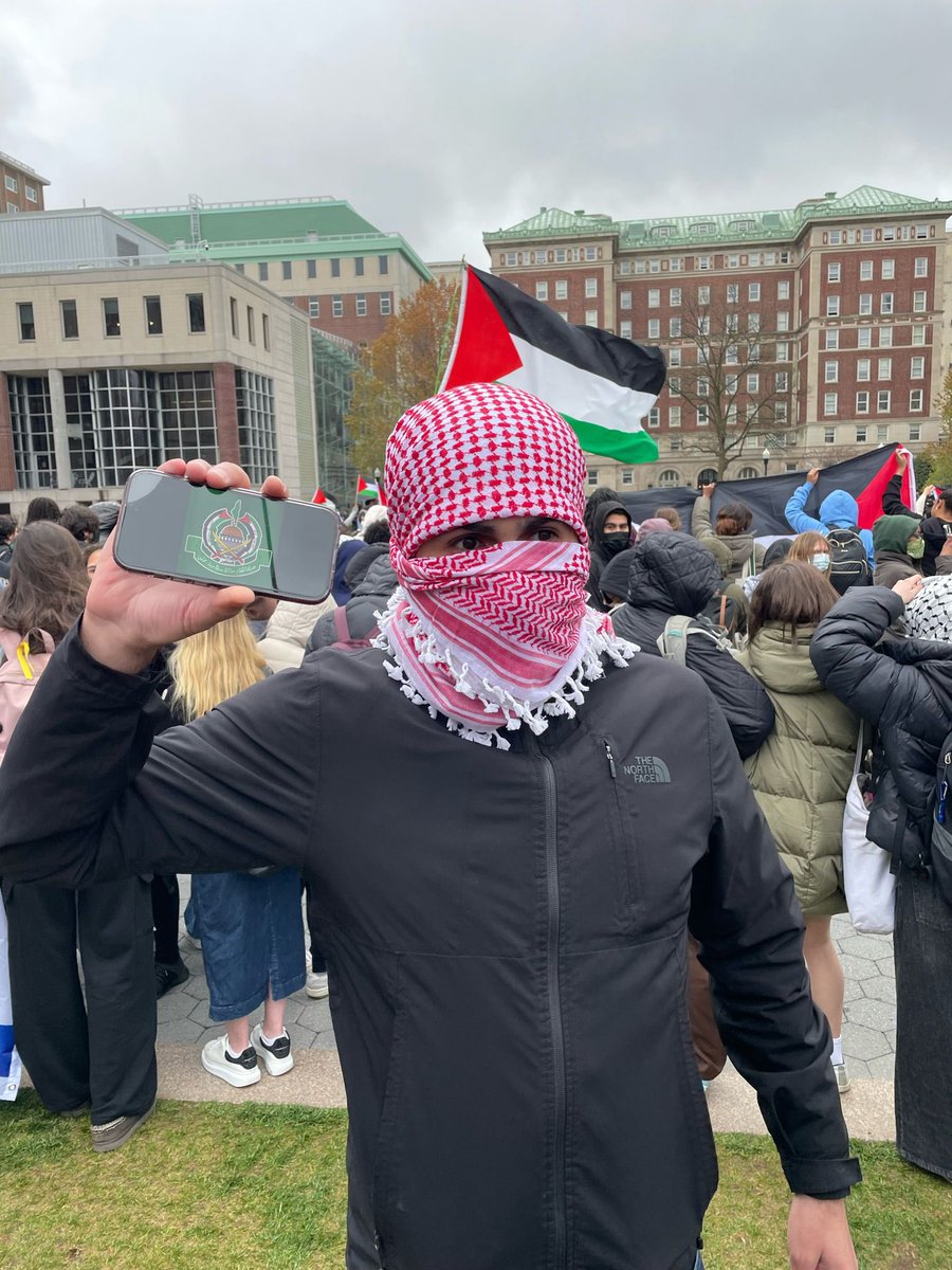 At the Columbia protest right now, a student (presumably, you need ID to be there) proudly displays a Hamas logo on his phone. America you have a problem. The Jews are the first, but they are never the last.
