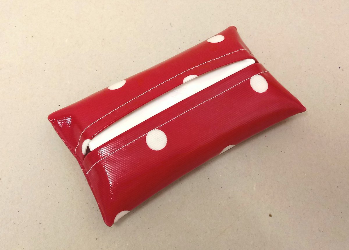 Tissue holder in red oilcloth with white spots, tissues included. Perfect for a pocket or handbag and can be wiped clean. #tissueholder #handmadeintheuk #giftforher #red #newonfolksy #spotty #handbagtissues folksy.com/items/8247913-…