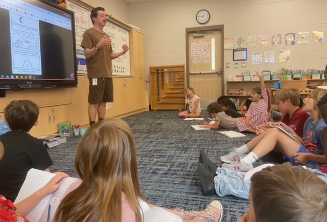 A photo of me teaching haiku poetry using a poem of mine on @havehadhavehad to lower elementary Montessori students yesterday. I hadn't previously realized how teachable this [visual] poem was. #NationalHaikuDay #NationalHaikuPoetryDay #NationalPoetryMonth