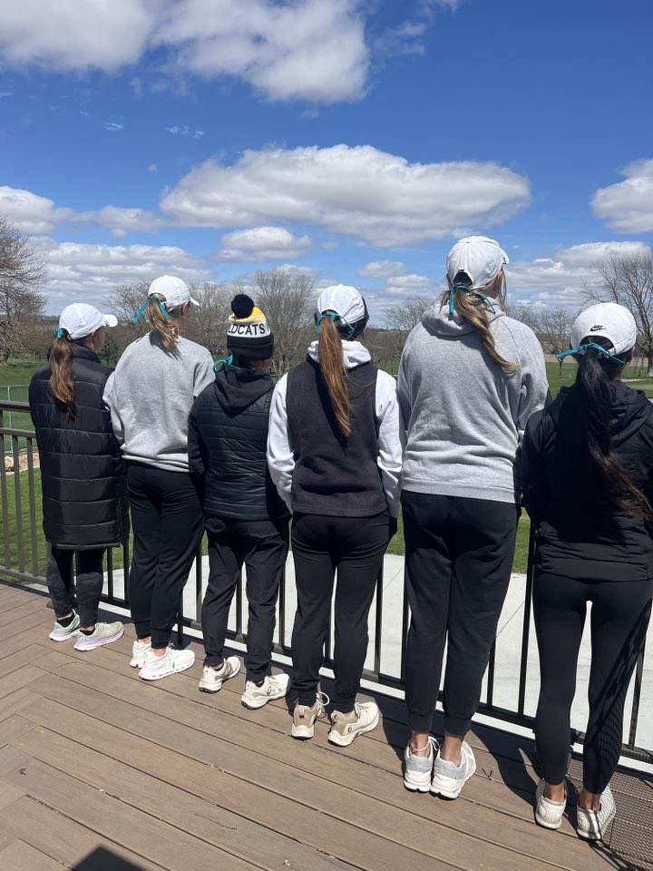 The golf team is showing support for sexual assault awareness month by wearing teal ribbon!! #onelove #itsonus