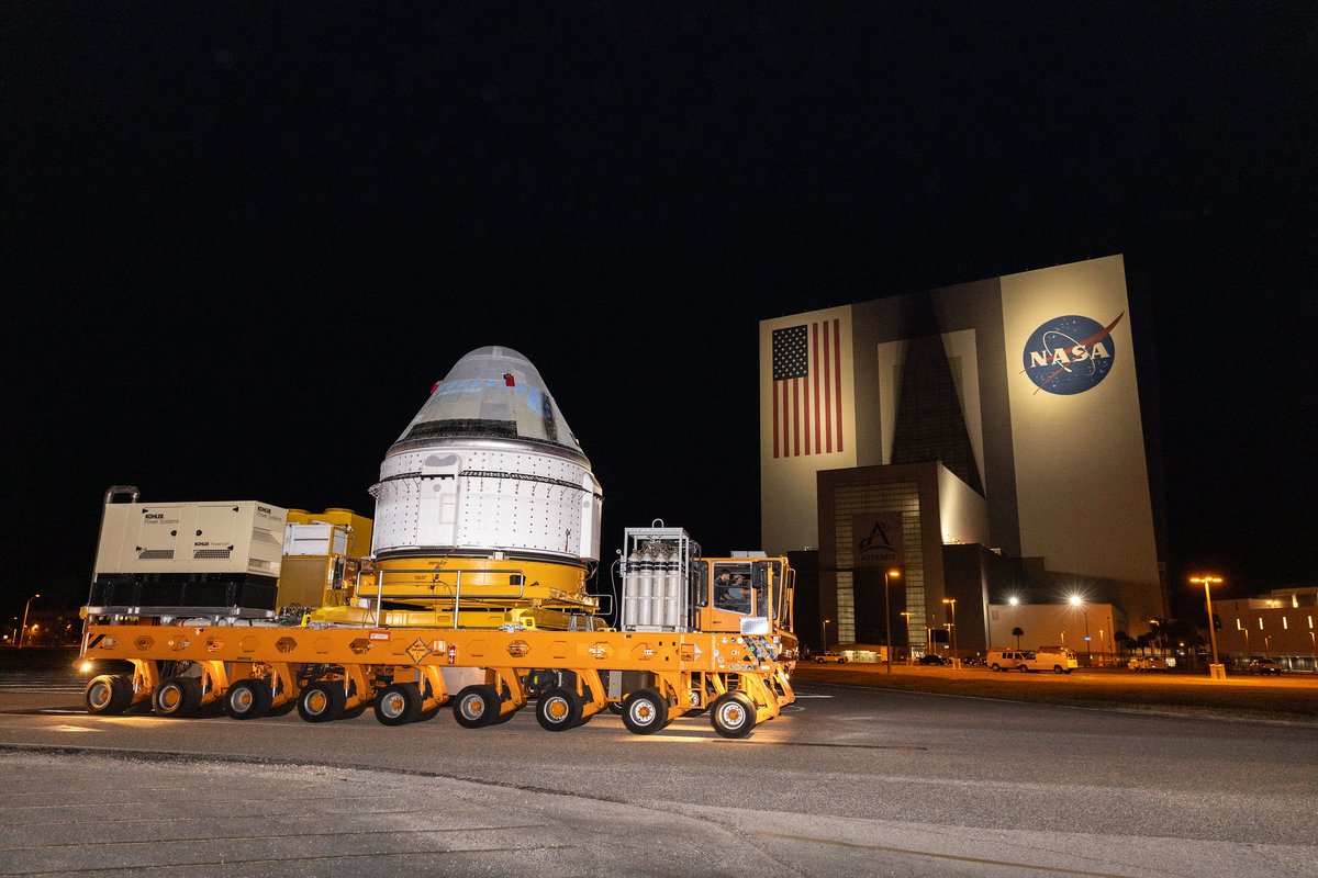 After our factory doors opened, the spacecraft carefully made its way around the Commercial Crew and Cargo Processing Facility, stopped for astronaut photos, then passed the historic Vehicle Assembly Building.