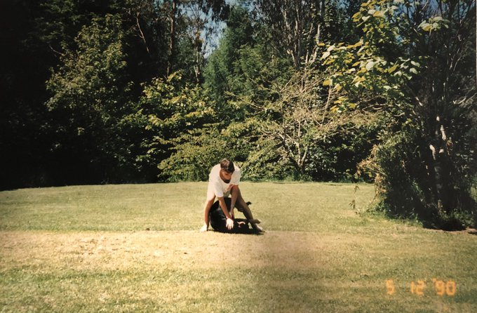 QT a picture of a younger you. Me wrestling the family hound, aged 16