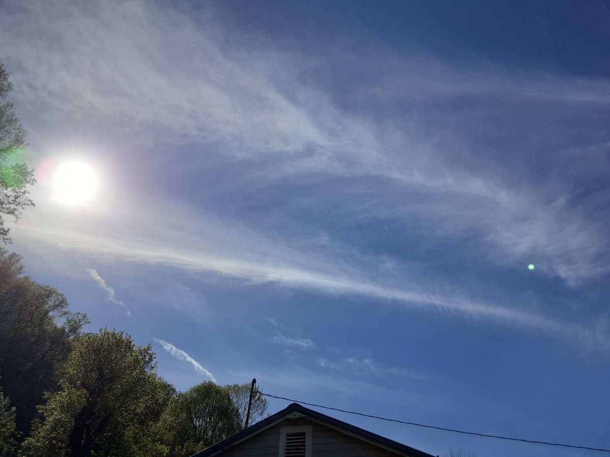 4:30pm Wv. Still spraying the poison! The Moon is also visible in the second photo. #wedonotconsent #chemtrails #blockthesun #poisonsky #populationcontrol #GeoEngineering #LookUp
