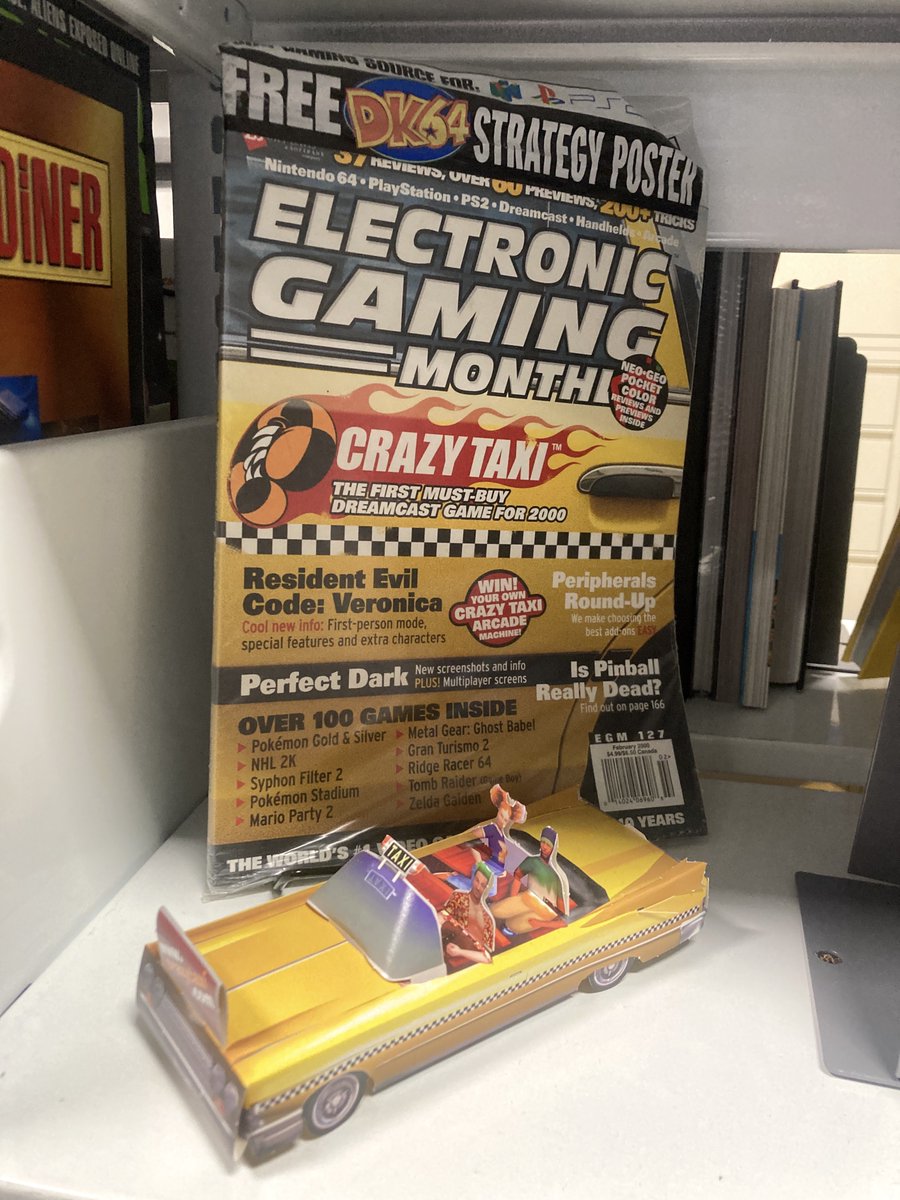 As featured in the VGHF Library, this classic copy of EGM features Sega's Crazy Taxi (which has a new version coming out soon!), alongside a papercraft version of said taxi. *cue The Offspring soundtrack*