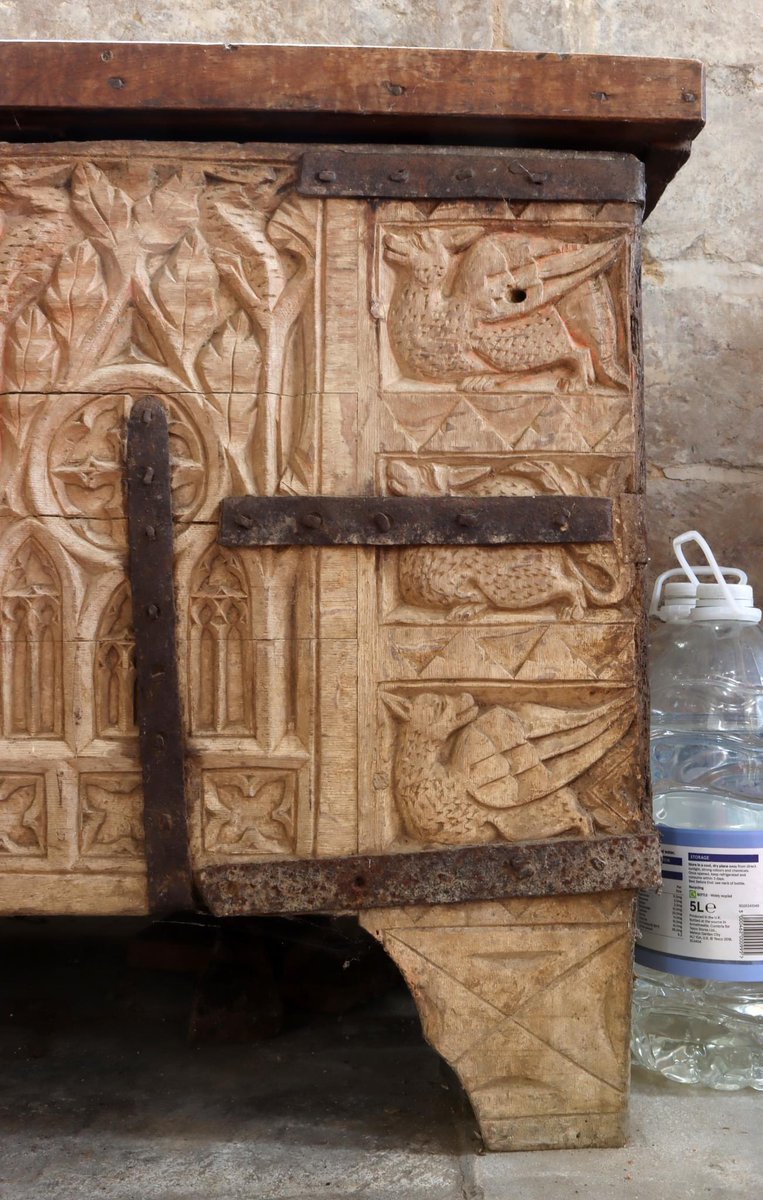 This little chest has been sitting quietly in Haconby church in Lincolnshire since the mid-fourteenth century. It is an exquisite example of medieval carved workmanship decorated with traceried panels and dragons.