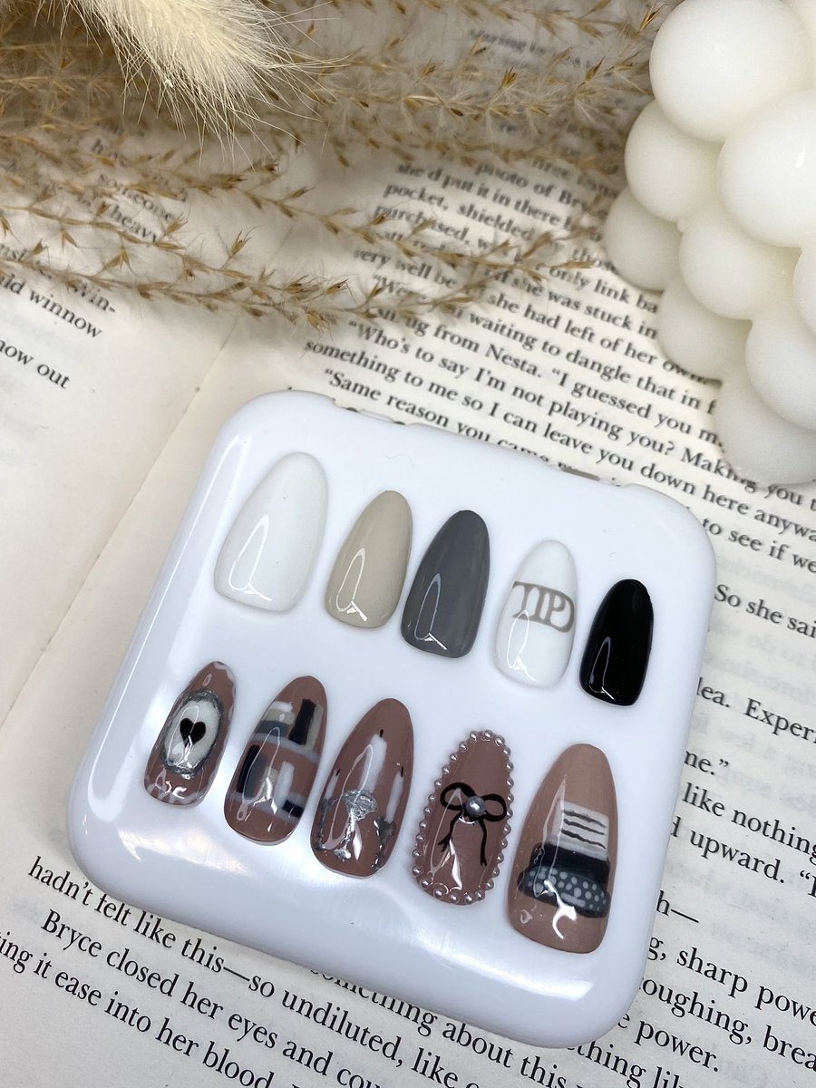 Stephgrosse18's tweet photo. @taylornation13 My nails are ready for #TSTTPD 🤍📖🎼🕯️✍🏼🩶 https://t.co/JoBC4xwmh2