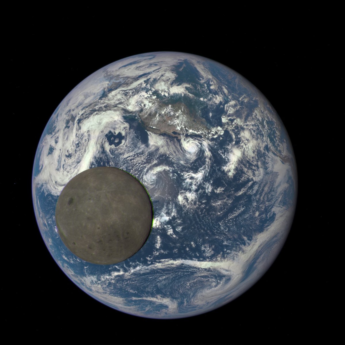 From a million miles away, NASA captures Moon crossing face of Earth. (Yes, this is a real image) Credit: NASA/NOAA