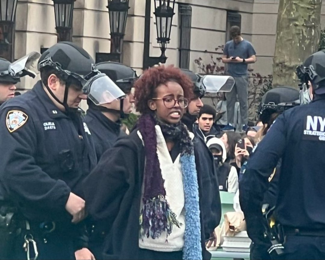 Ilhan Omar's daughter arrested and in custody amid NYC anti-Israel protests at Columbia University. Isra Hirsi had received a warning for breaking school rules yesterday which she ignored. She was suspended and arrested @ an illegal encampment today.