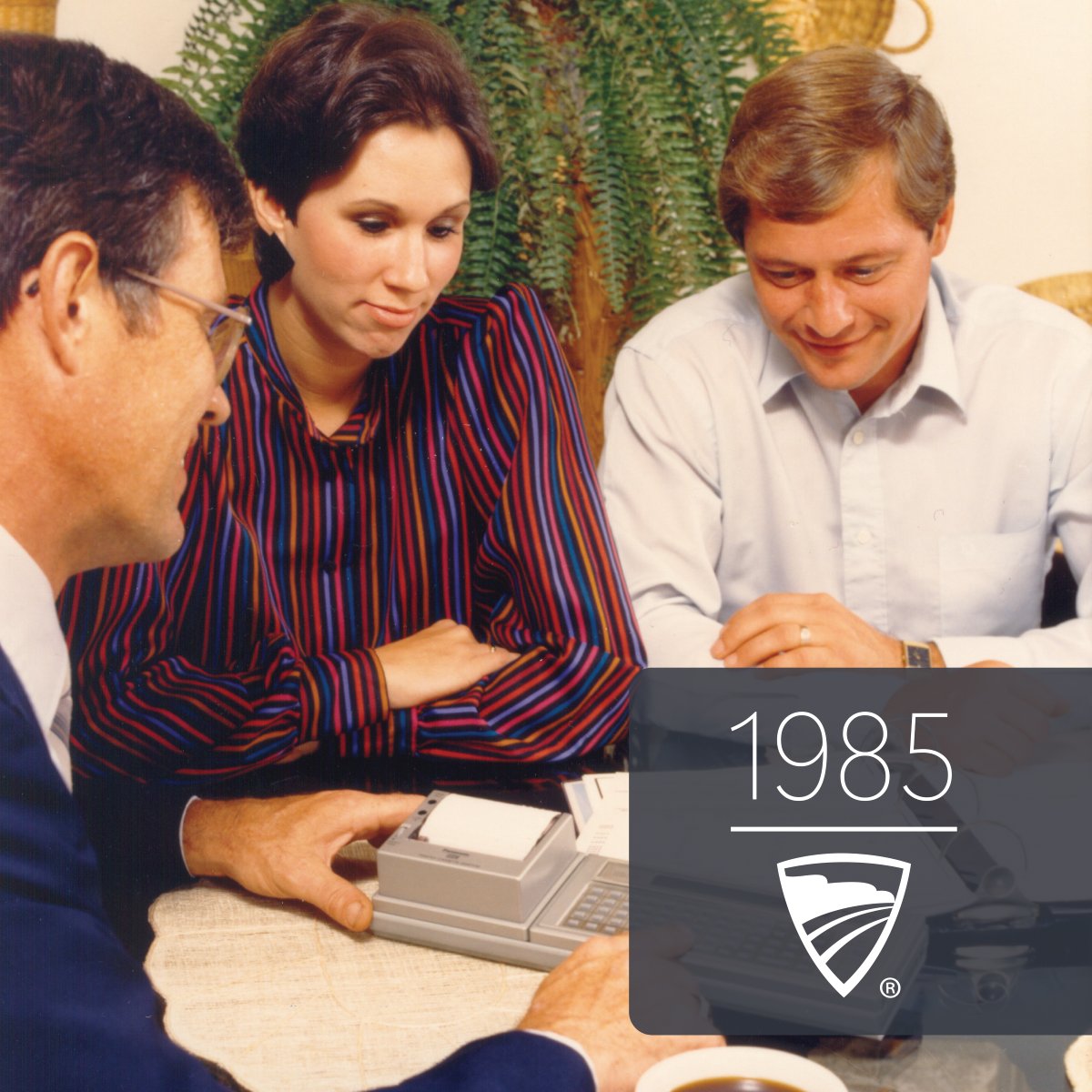 Our financial reps have a long history of helping members on their financial journey. Check out this photo from 1985 of a rep helping a member with a handheld computer! #Modernsince1883 #Modernpioneer