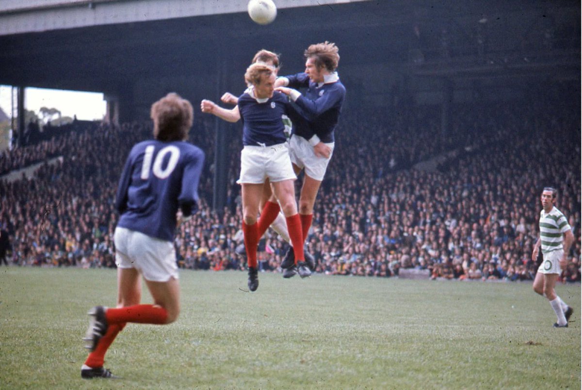 Shuggie Edvaldsson in the thick of it against Dundee at Parkhead in 1975 as Tommy Callaghan looks on.