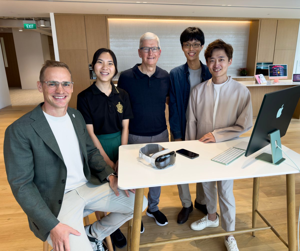 tim_cook's tweet photo. From solving puzzles to training knights, Jakob, Tongyu, Chiny, and Yiwei shared demos of their games with me at the new Apple Developer Center in Singapore. I loved hearing about your journeys... as students, teachers, and Apple Design Award Winners! https://t.co/x2T3PW04c7